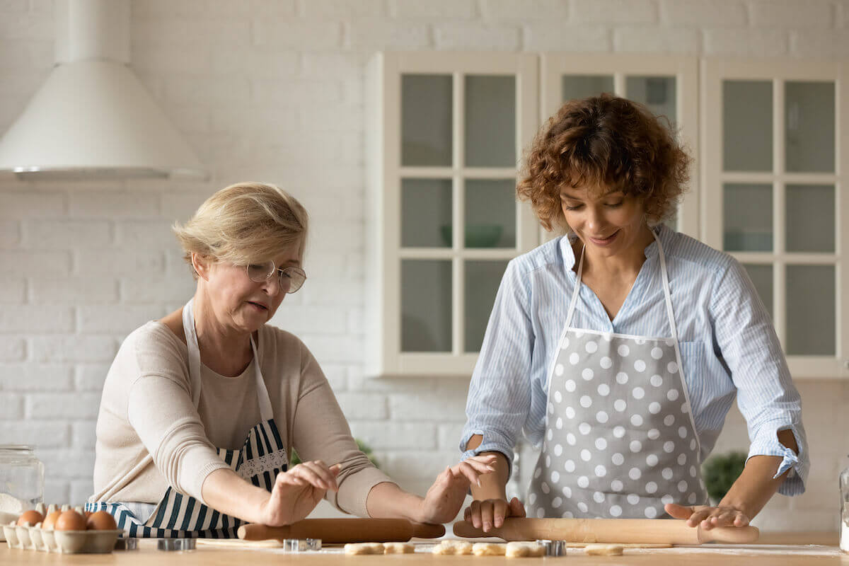 Woman and Daughter Baking Together, Rolling Dough-Dementia Care Activities