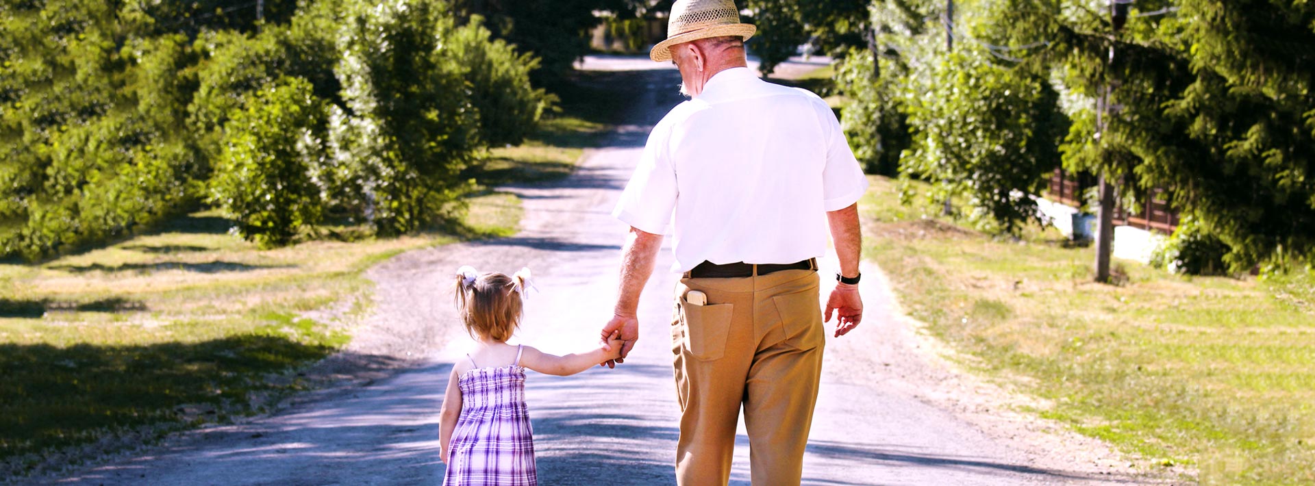 Senior walking with child